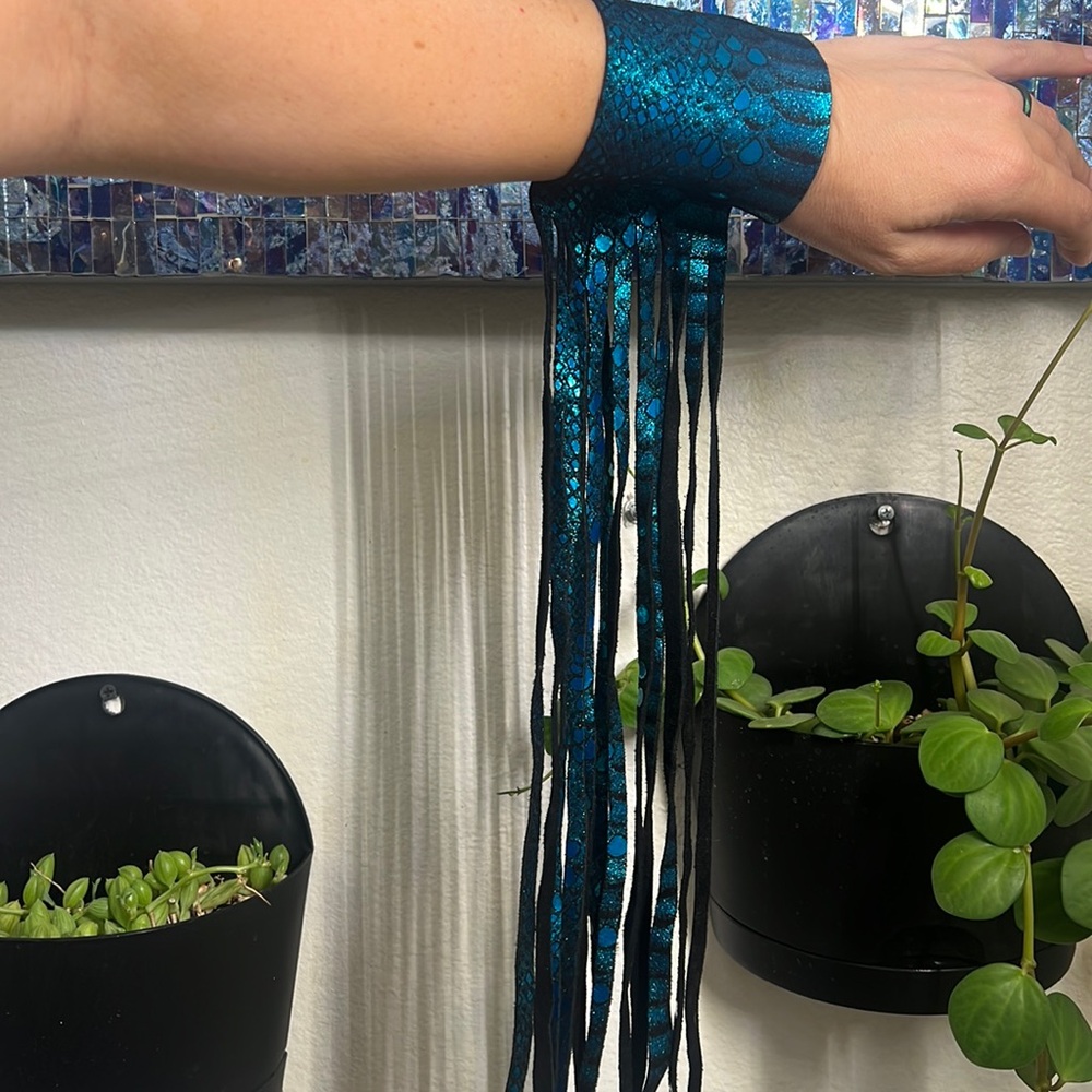 Turquoise printed leather long fringe bracelet
